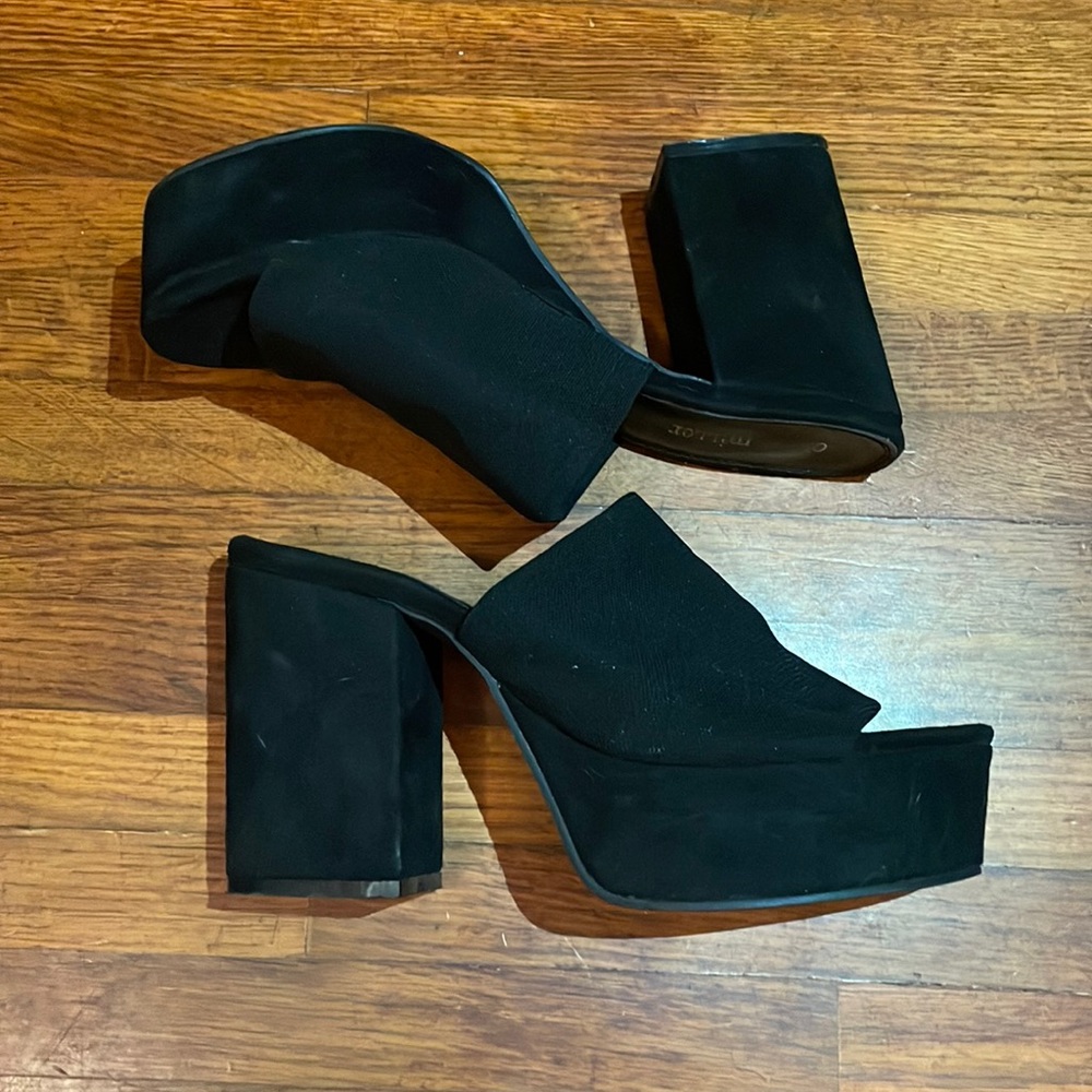 Selling a pair of black olivia miller slide on heel/clogs in a size 8.5